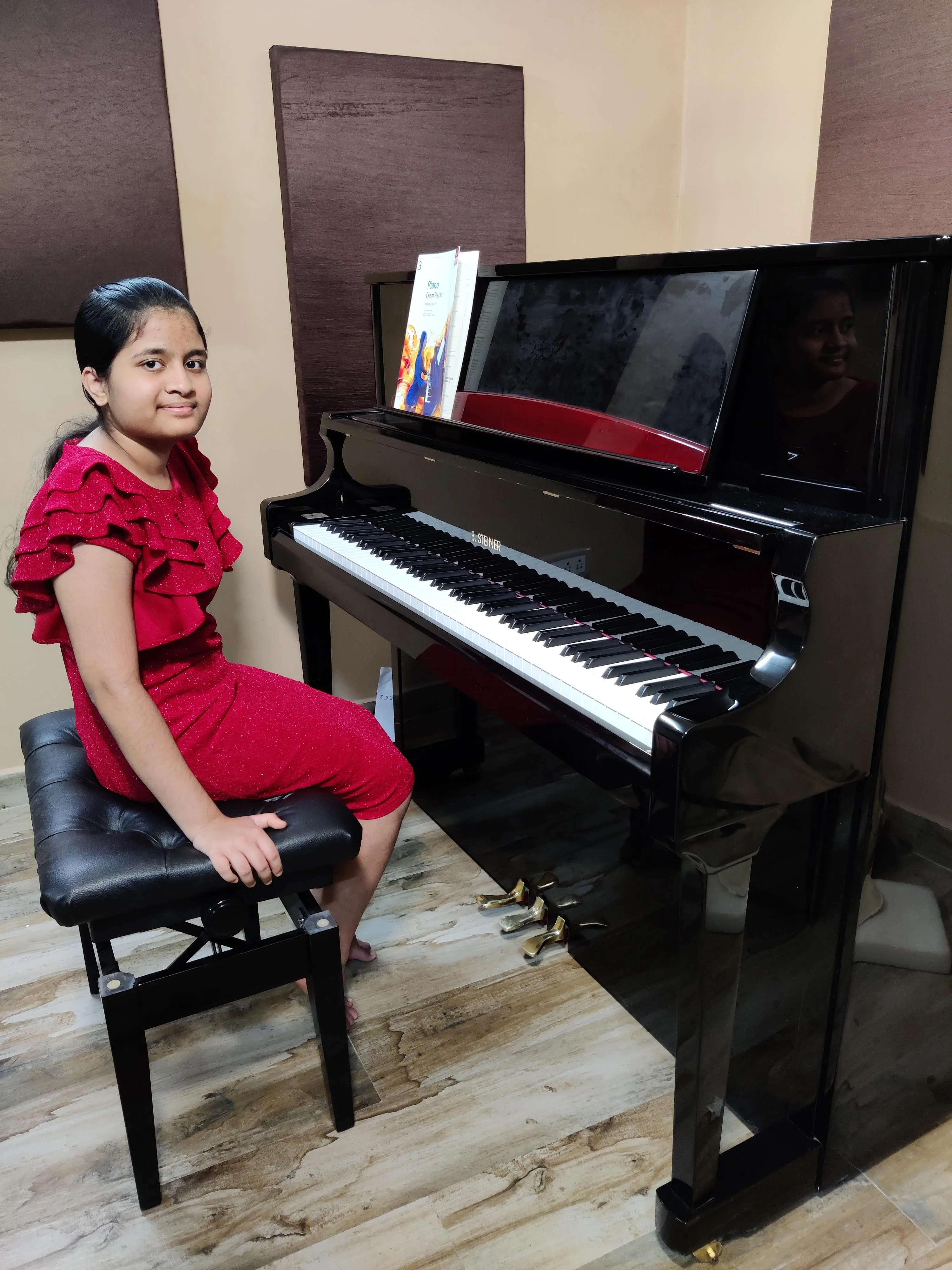 Student at the piano during ABRSM grade exam at Fingersmith's Garage