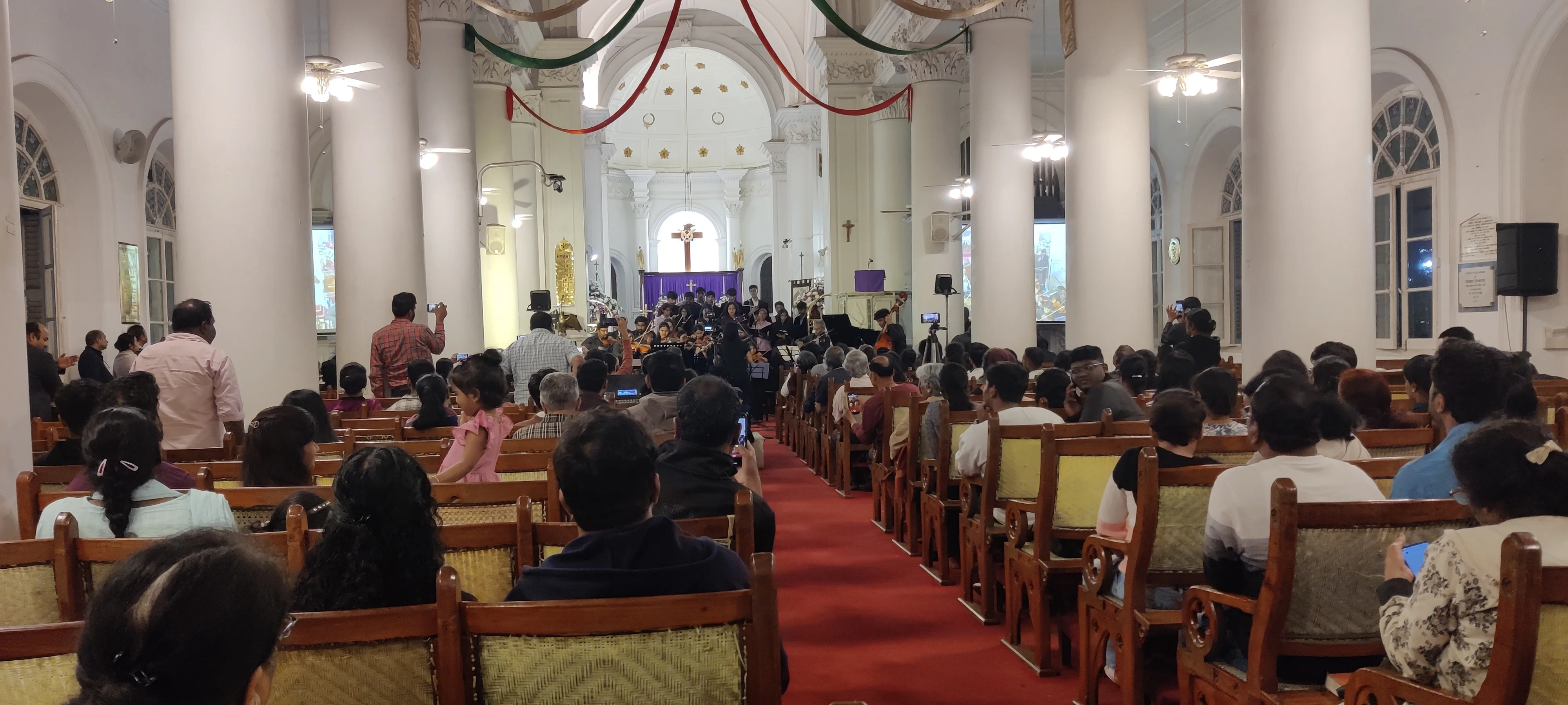 Fingersmith Collective performing at St. Mark's Cathedral, Bangalore — full audience standing ovation