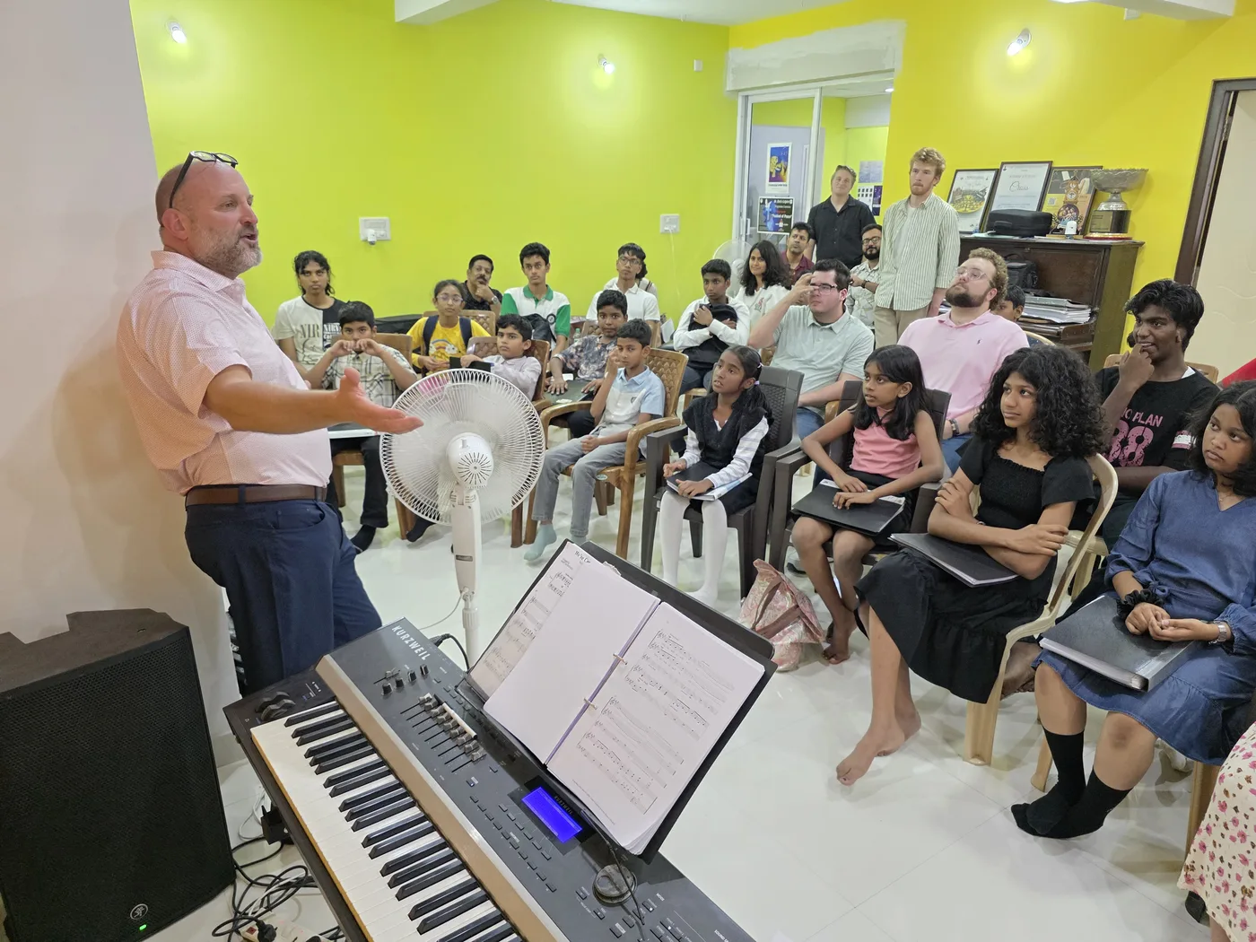 Joseph Bolin of California Baptist University addressing forty-plus Fingersmith's Garage students at the CBU faculty workshop, June 2026