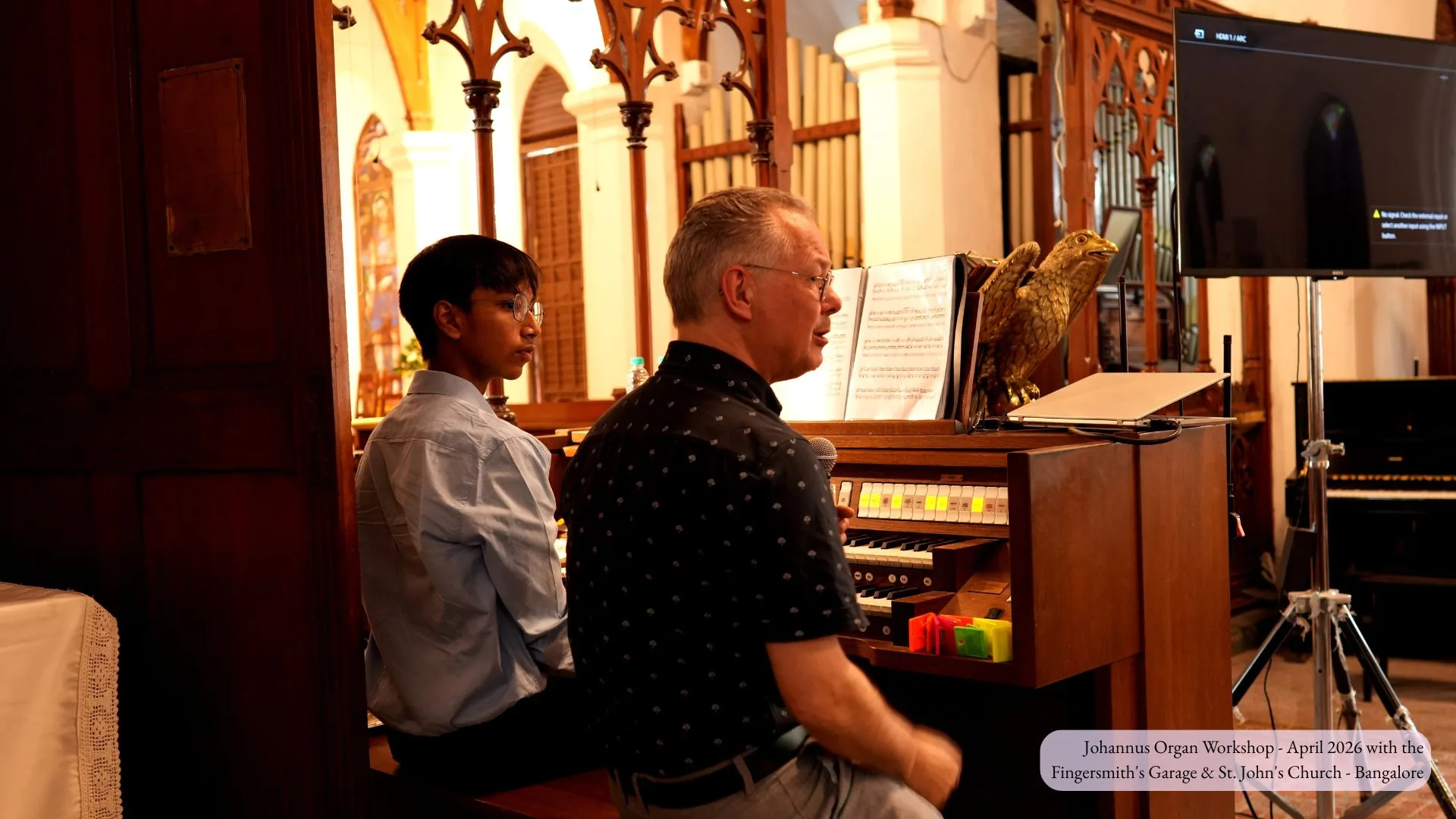Martin van Heerde from Johannus Organs Netherlands at the Johannus Ecclesia T-270 console with an FSG student during the organ workshop at St. John's Church Bangalore, April 2026