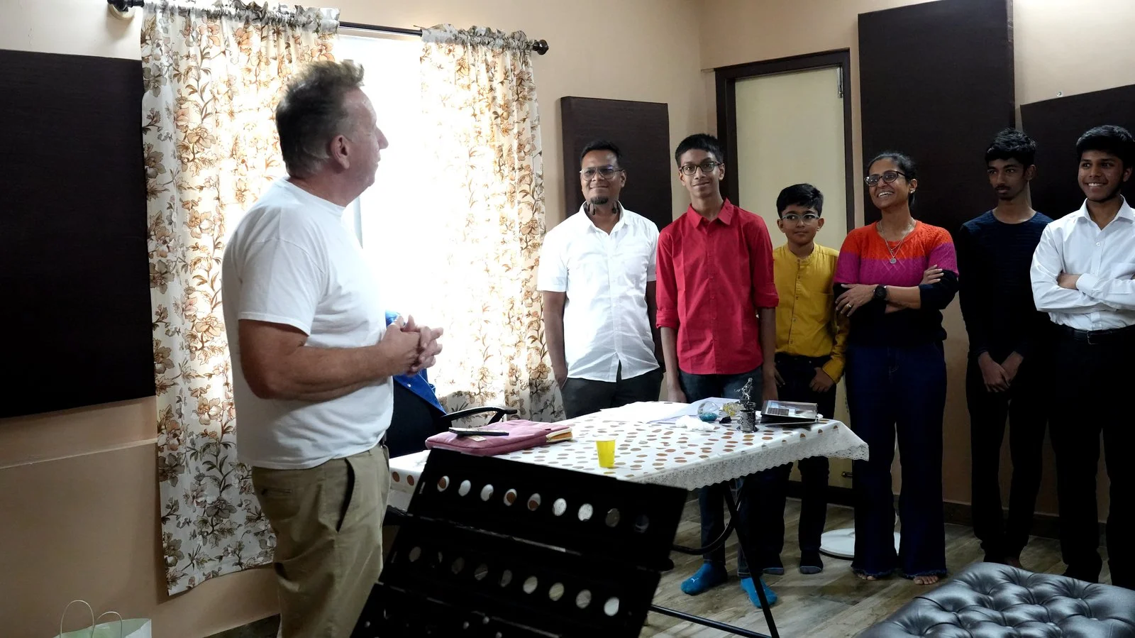 Parents and candidates with ABRSM examiner Mark Tanner after exams November 2024