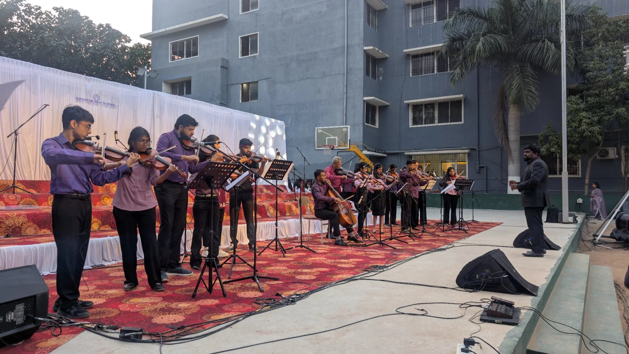 FSG strings ensemble performing outdoors at Christmas concert Dec 2025